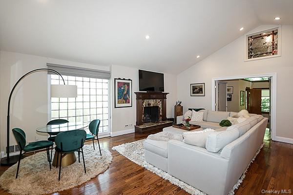 32 Randy Lane Plainview, NY 11803 - Photo 5 of 26 a living room with fireplace furniture and a flat screen tv