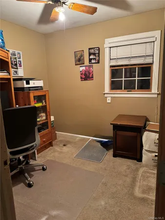 a room with furniture and window