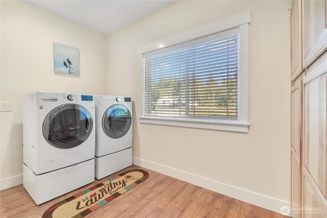 a utility room with dryer and washer