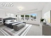 a bedroom with a bed and a night stand