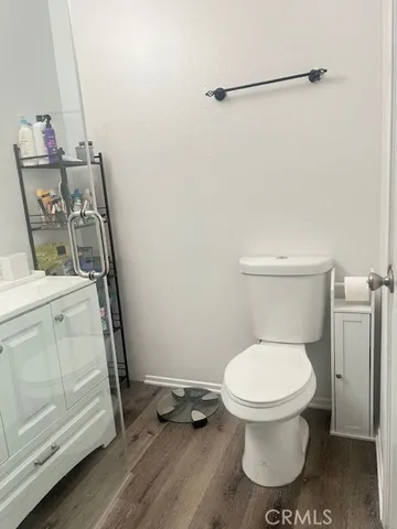 a bathroom with a toilet and a sink