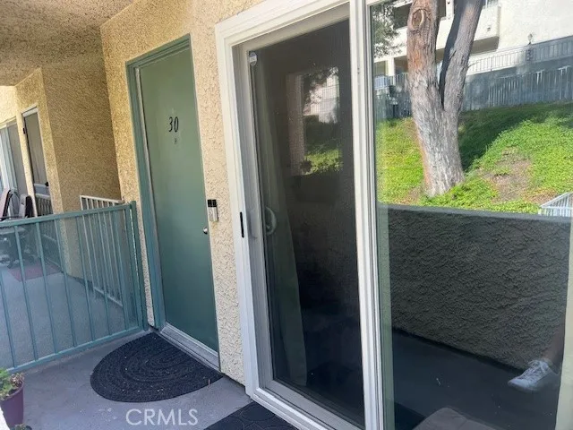 a view of a entryway door of the house