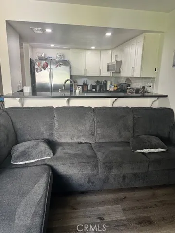a kitchen with a cabinets and a sink