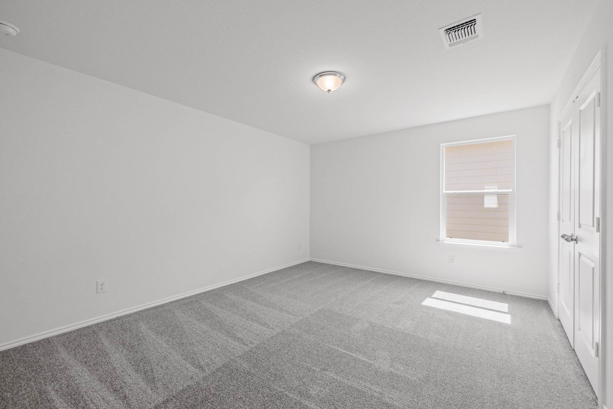 260 Feathers Street Jarrell, TX 76537 - Photo 22 of 34 an empty room with a window