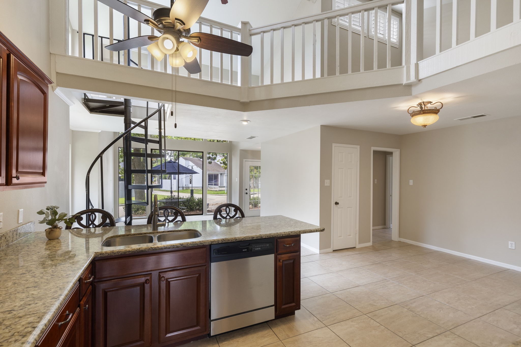 49 April Village Conroe, TX 77356 - Photo 12 of 46 a kitchen with stainless steel appliances granite countertop a sink and cabinets