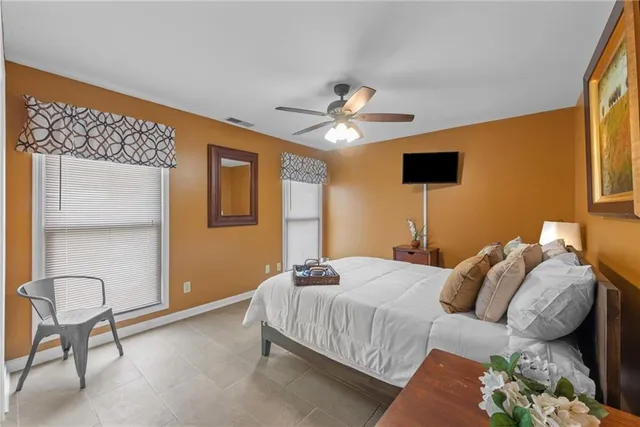 a backyard of a house with barbeque oven