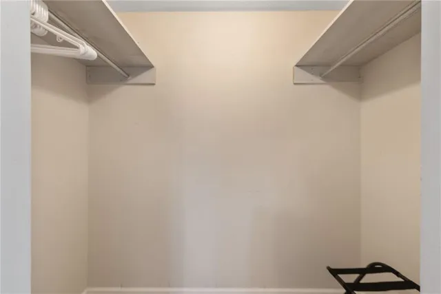 a view of a house with swimming pool and sitting area