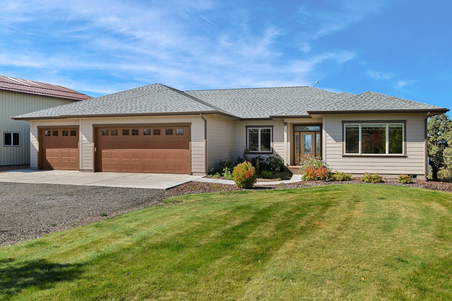 62860 Deschutes Road Bend, OR 97701 - Photo 2 of 34 Front yard/parking area is level.