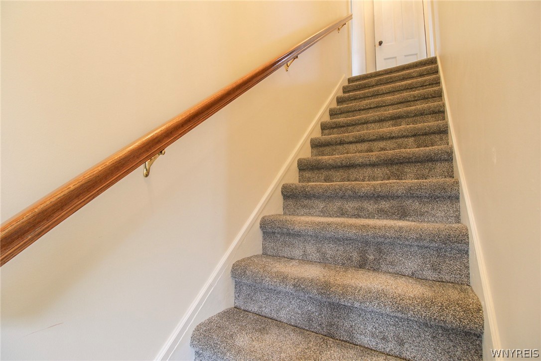 507 Canal Street Ridgeway, NY 14103 - Photo 9 of 25 stairway to 2nd floor - new carpet 11/2025