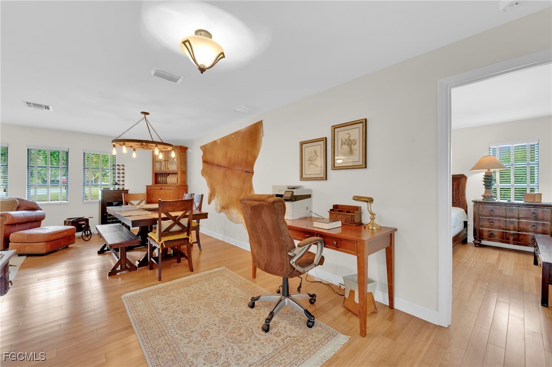 14501 Old Olga Road Fort Myers, FL 33905 - Photo 11 of 42 a view of a livingroom with workspace and a couch