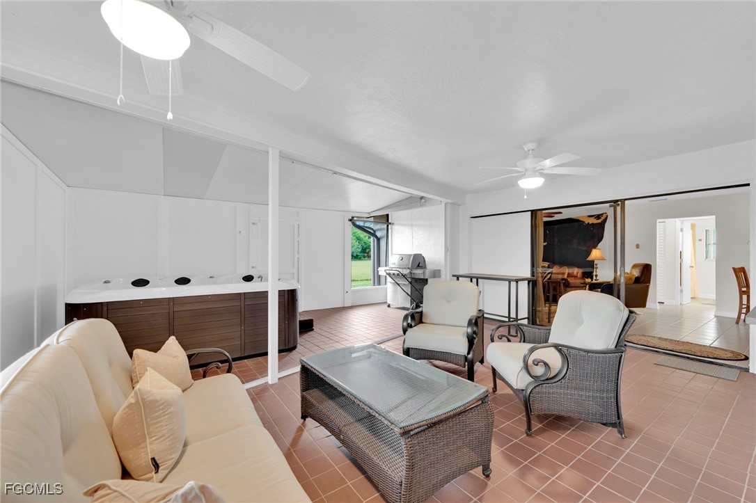 14501 Old Olga Road Fort Myers, FL 33905 - Photo 17 of 42 a living room with furniture and wooden floor