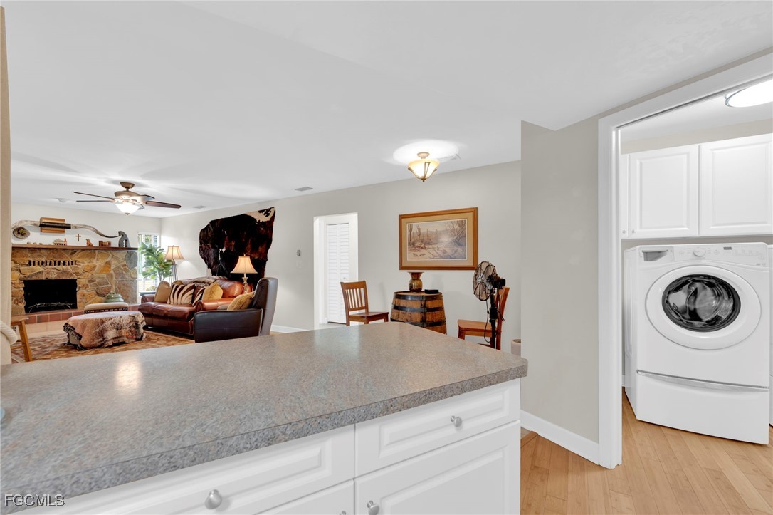 14501 Old Olga Road Fort Myers, FL 33905 - Photo 23 of 42 a living room with furniture and a mirror