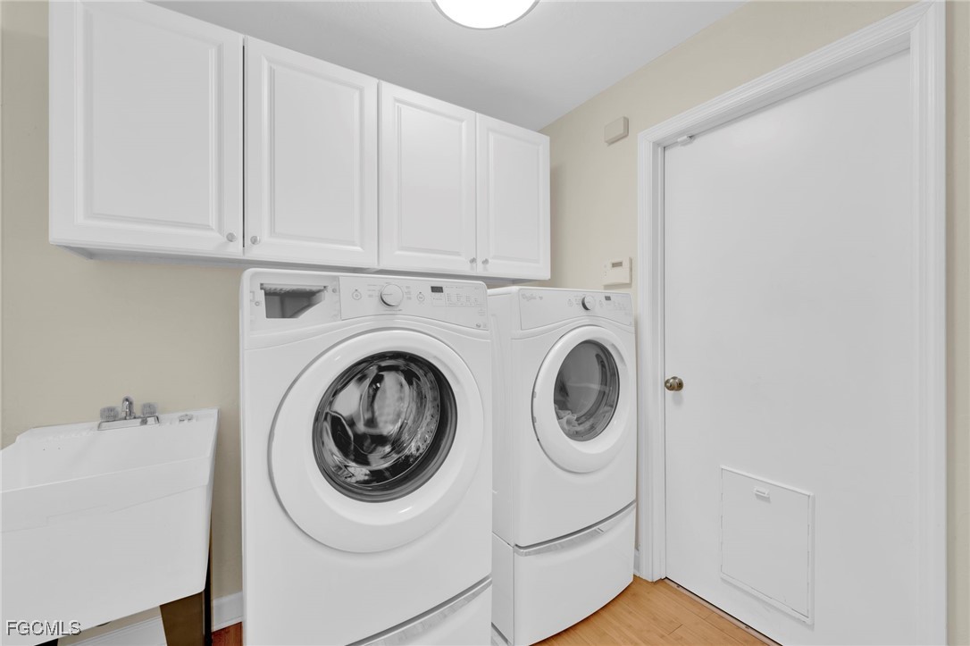 14501 Old Olga Road Fort Myers, FL 33905 - Photo 35 of 42 a utility room with dryer and washer