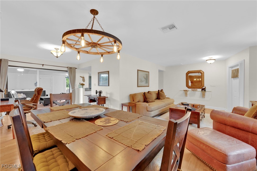 14501 Old Olga Road Fort Myers, FL 33905 - Photo 10 of 42 a view of a dining room with furniture