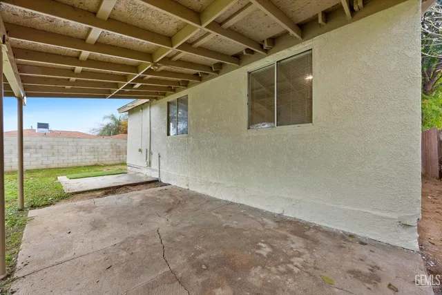 a view of a backyard of a house
