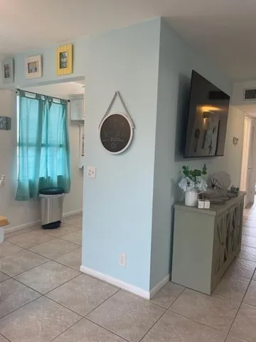 a kitchen with a sink and a stove