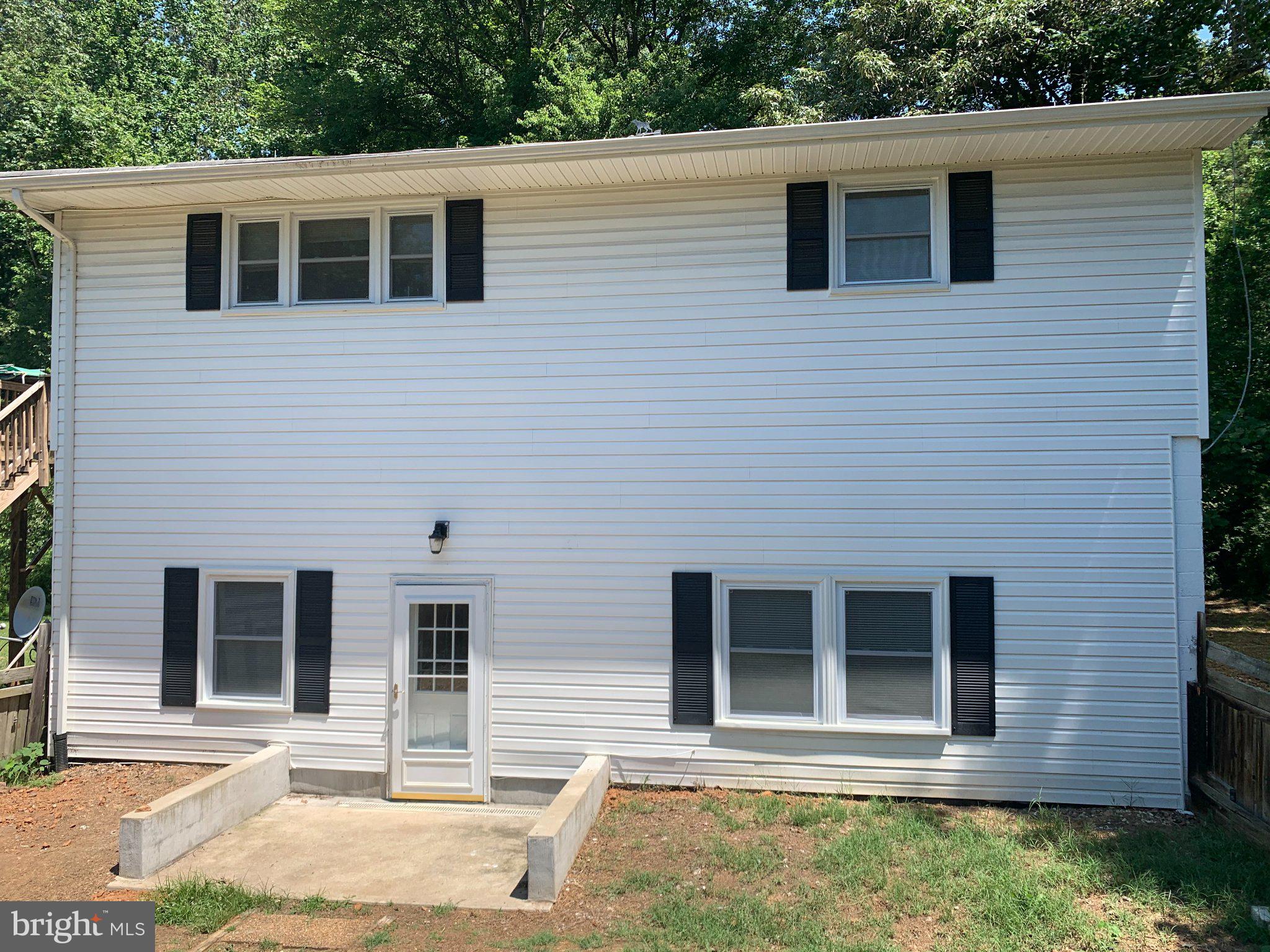 2446 Mountain View Road Stafford, VA 22556 - Photo 1 of 11 a house that has a large window