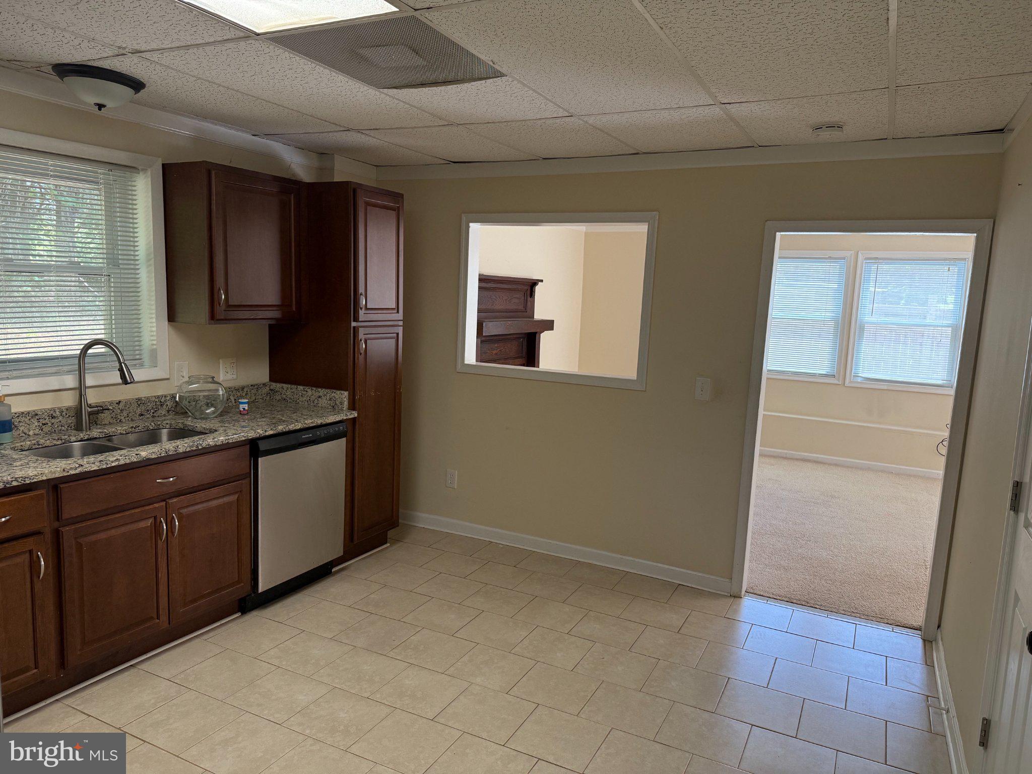 2446 Mountain View Road Stafford, VA 22556 - Photo 3 of 11 a bathroom with a granite countertop sink and a mirror