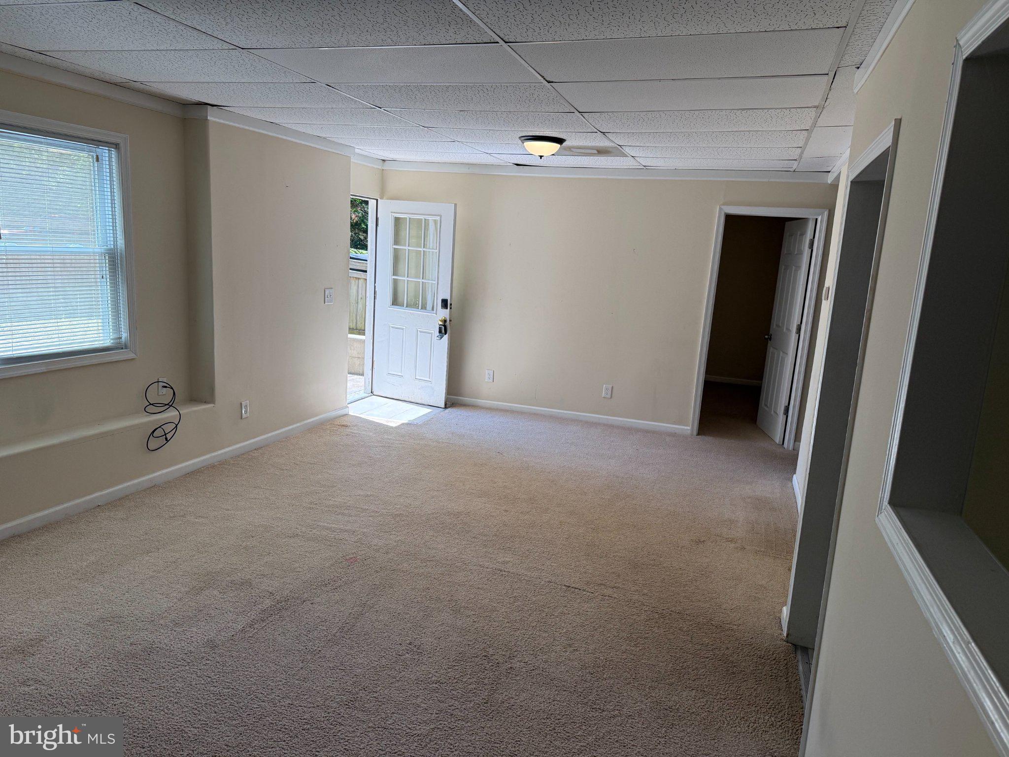 2446 Mountain View Road Stafford, VA 22556 - Photo 6 of 11 a view of an empty room with a window