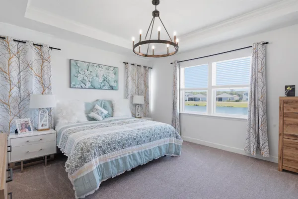 a bathroom with a sink mirror and toilet