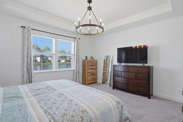 a bedroom with a bed and a closet