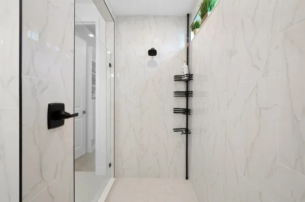 a view of a lake with a garden and chair