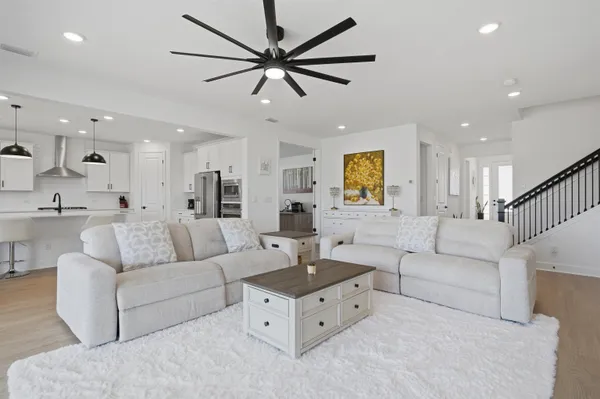 a bathroom with a double vanity sink mirror and shower
