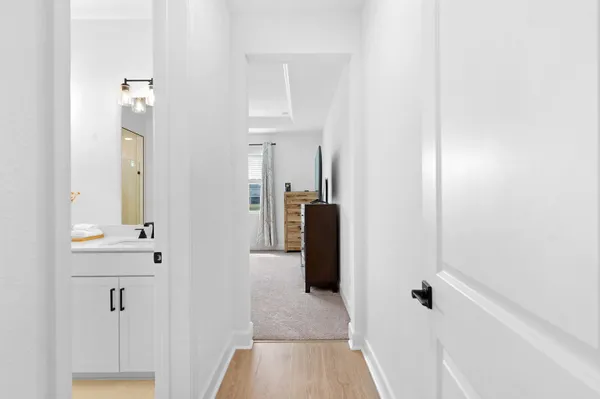 a view of a room with wooden door