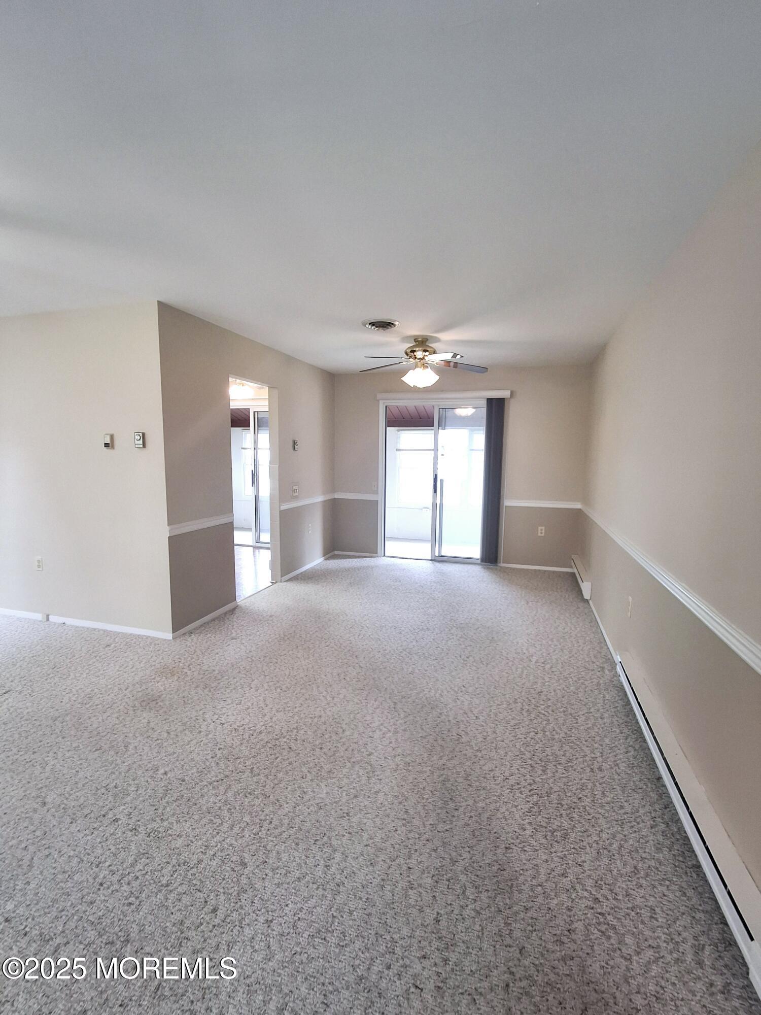 92 Sunset Road, Unit 60 Whiting, NJ 08759 - Photo 7 of 25 a view of empty room with windows
