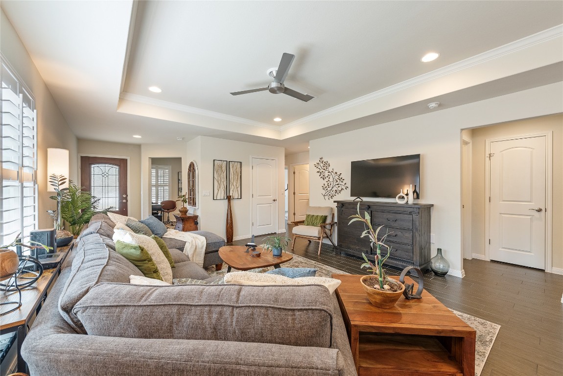 307 Hobby Street Georgetown, TX 78633 - Photo 12 of 40 a living room with furniture and a flat screen tv