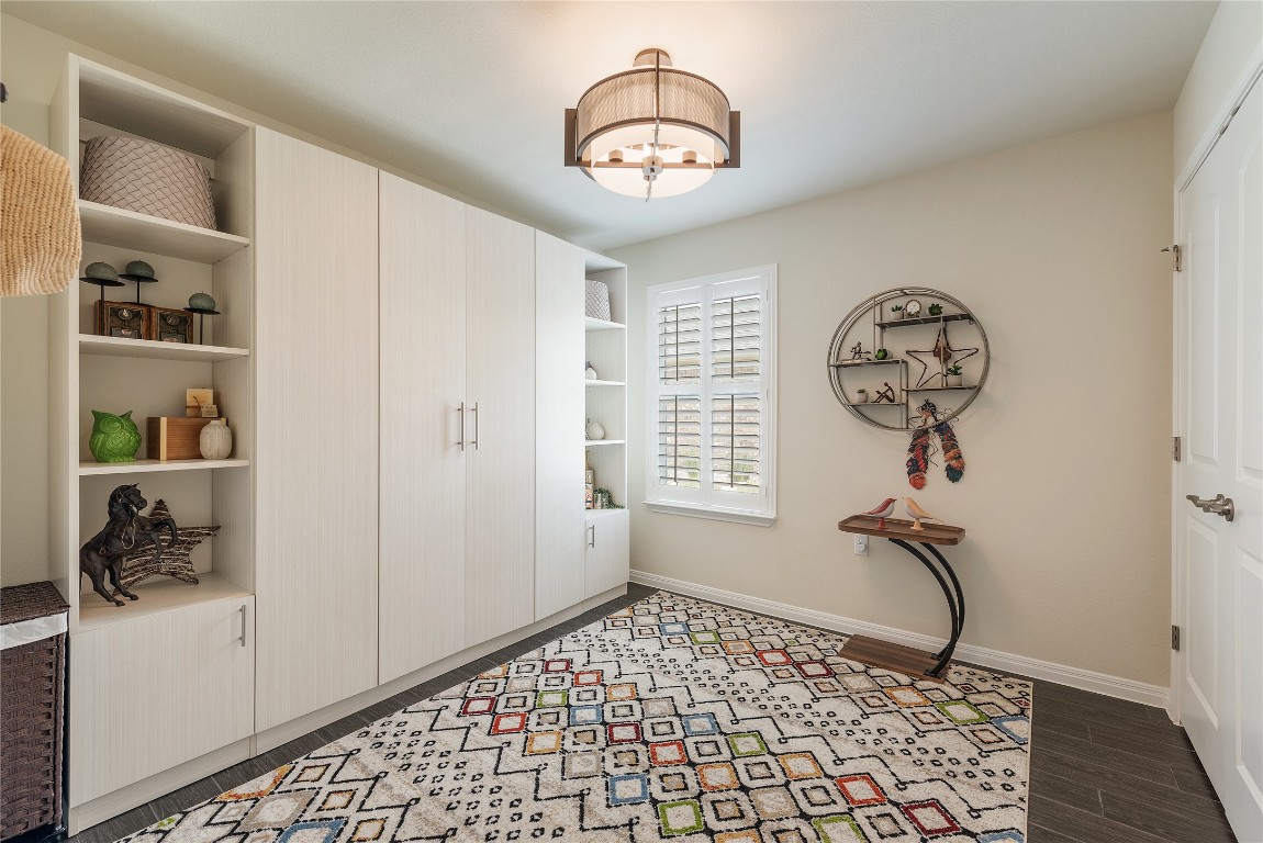 307 Hobby Street Georgetown, TX 78633 - Photo 27 of 40 a room with gym equipment