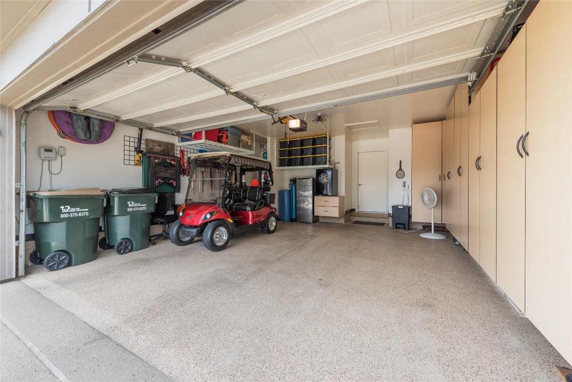 307 Hobby Street Georgetown, TX 78633 - Photo 30 of 40 a view of a garage with parked cars