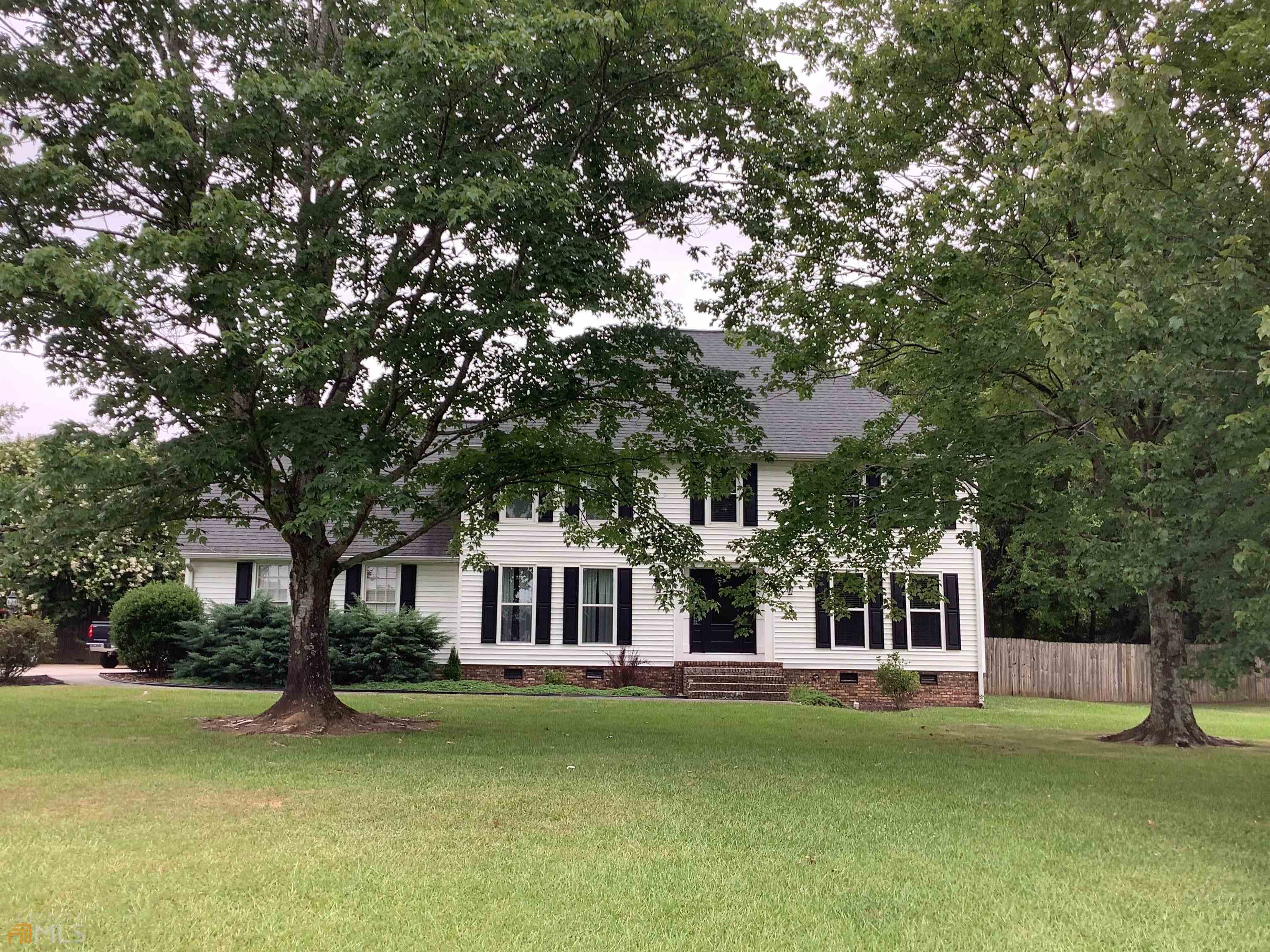 1140 Horseleg Creek Road Southwest Rome, GA 30165 - Photo 1 of 1 a view of a house with a garden
