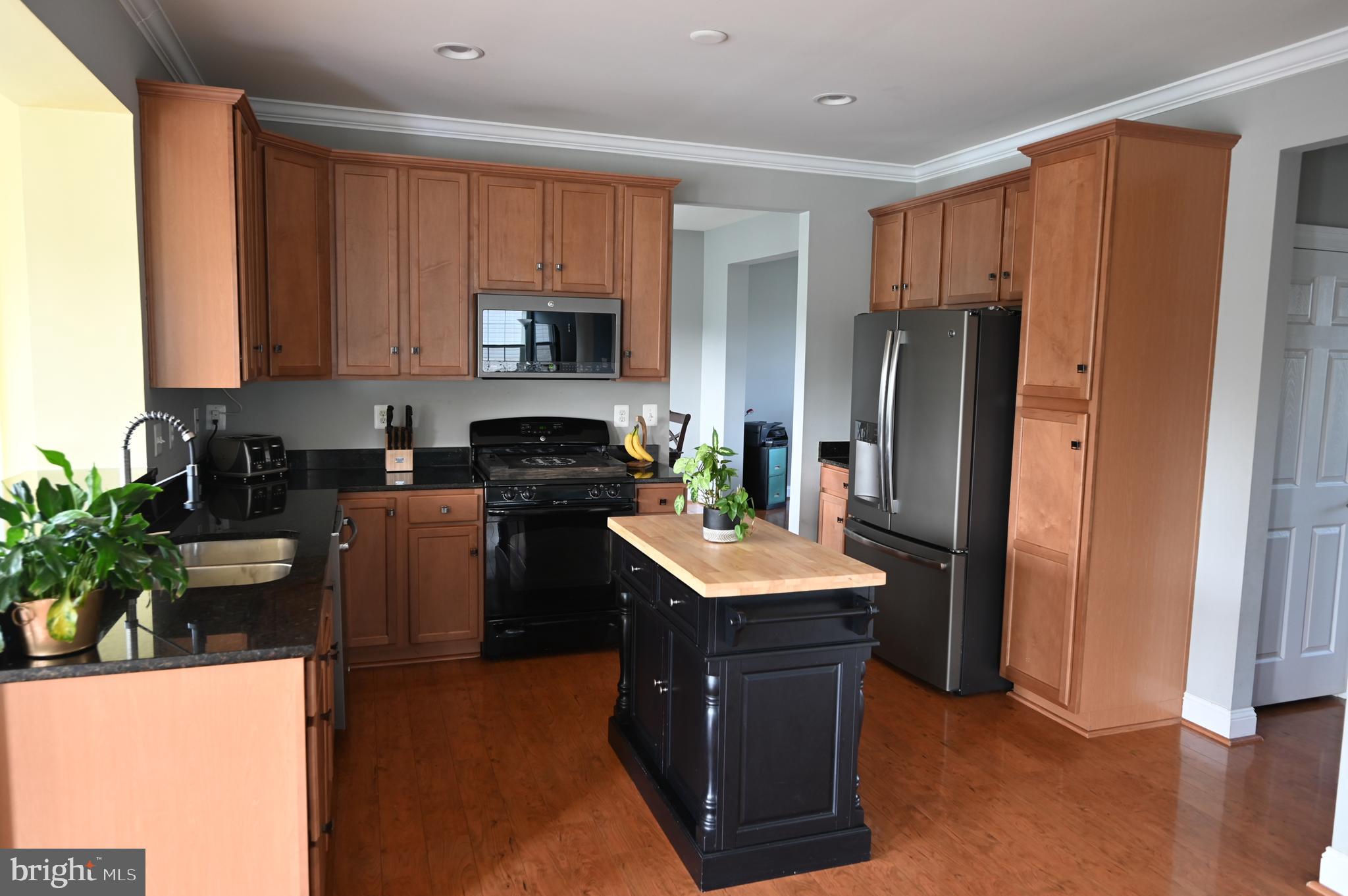 2528 Codorus Lane Spring Grove, PA 17362 - Photo 21 of 77 a kitchen with stainless steel appliances granite countertop a refrigerator stove and sink
