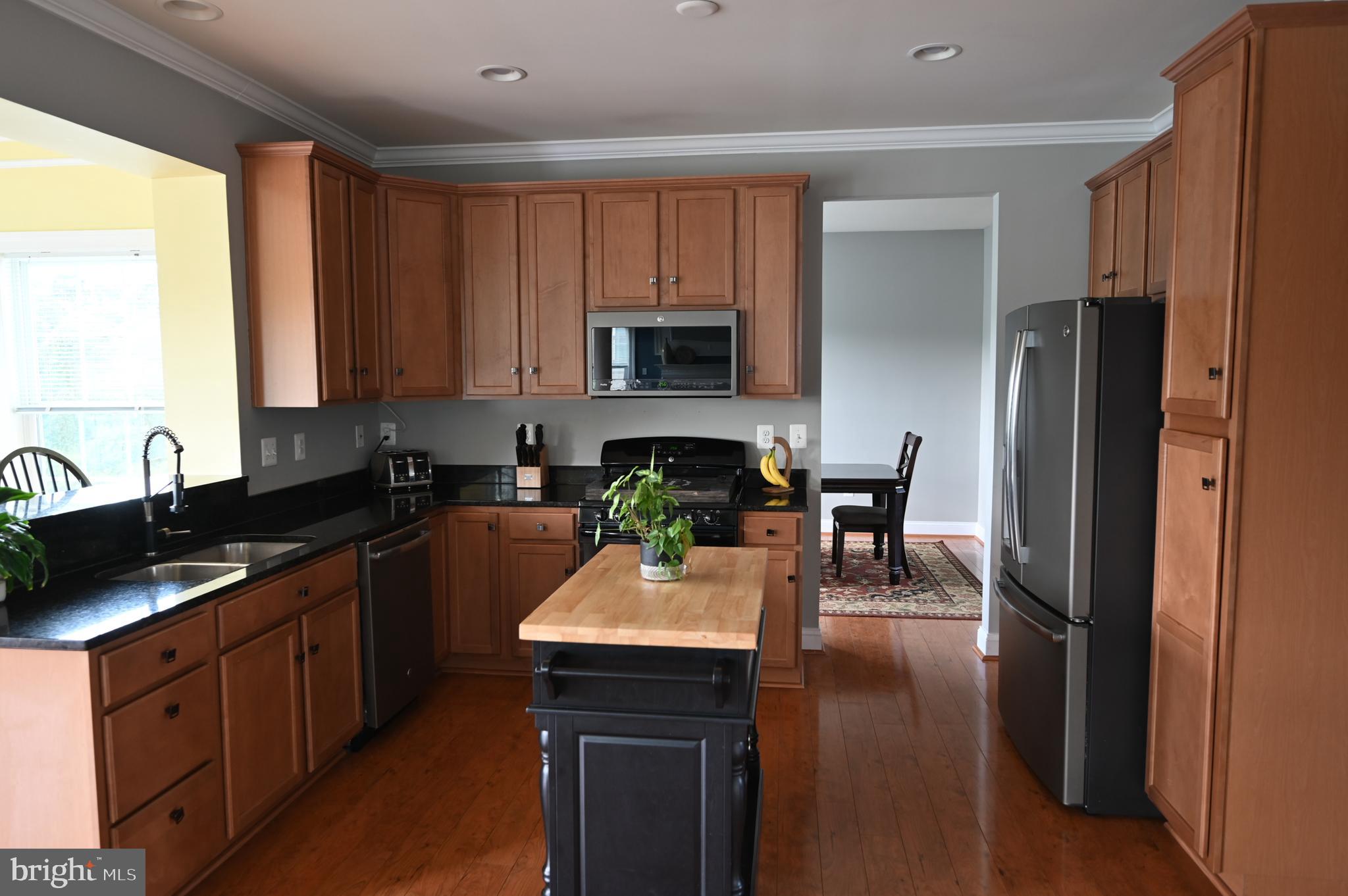 2528 Codorus Lane Spring Grove, PA 17362 - Photo 25 of 77 a kitchen with a refrigerator and a stove top oven