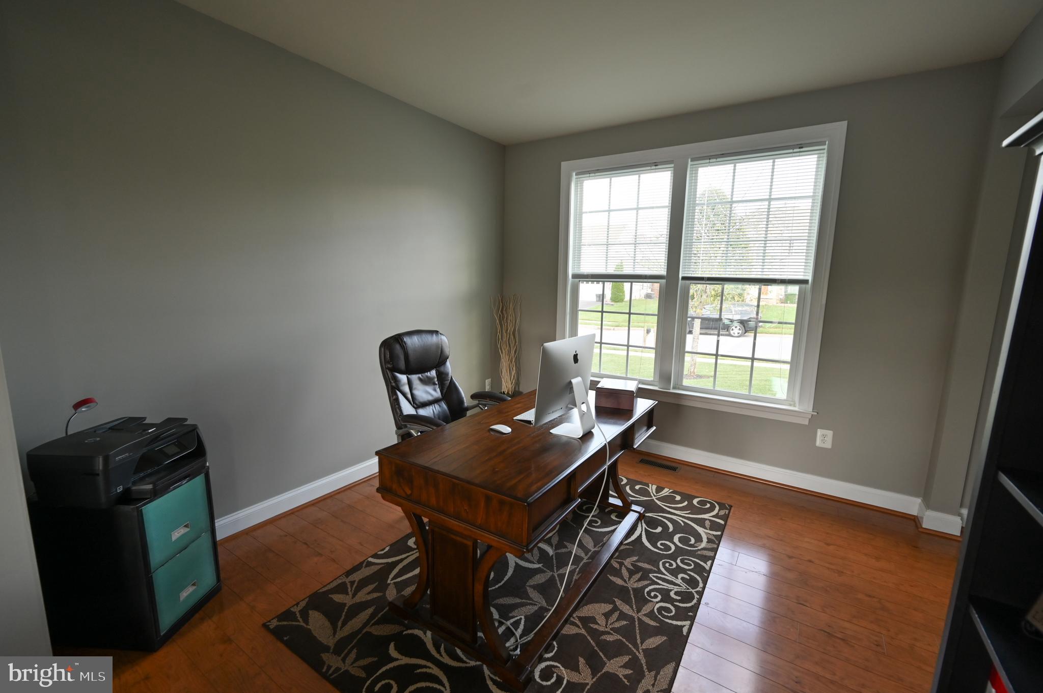 2528 Codorus Lane Spring Grove, PA 17362 - Photo 38 of 77 a living room with furniture and a window