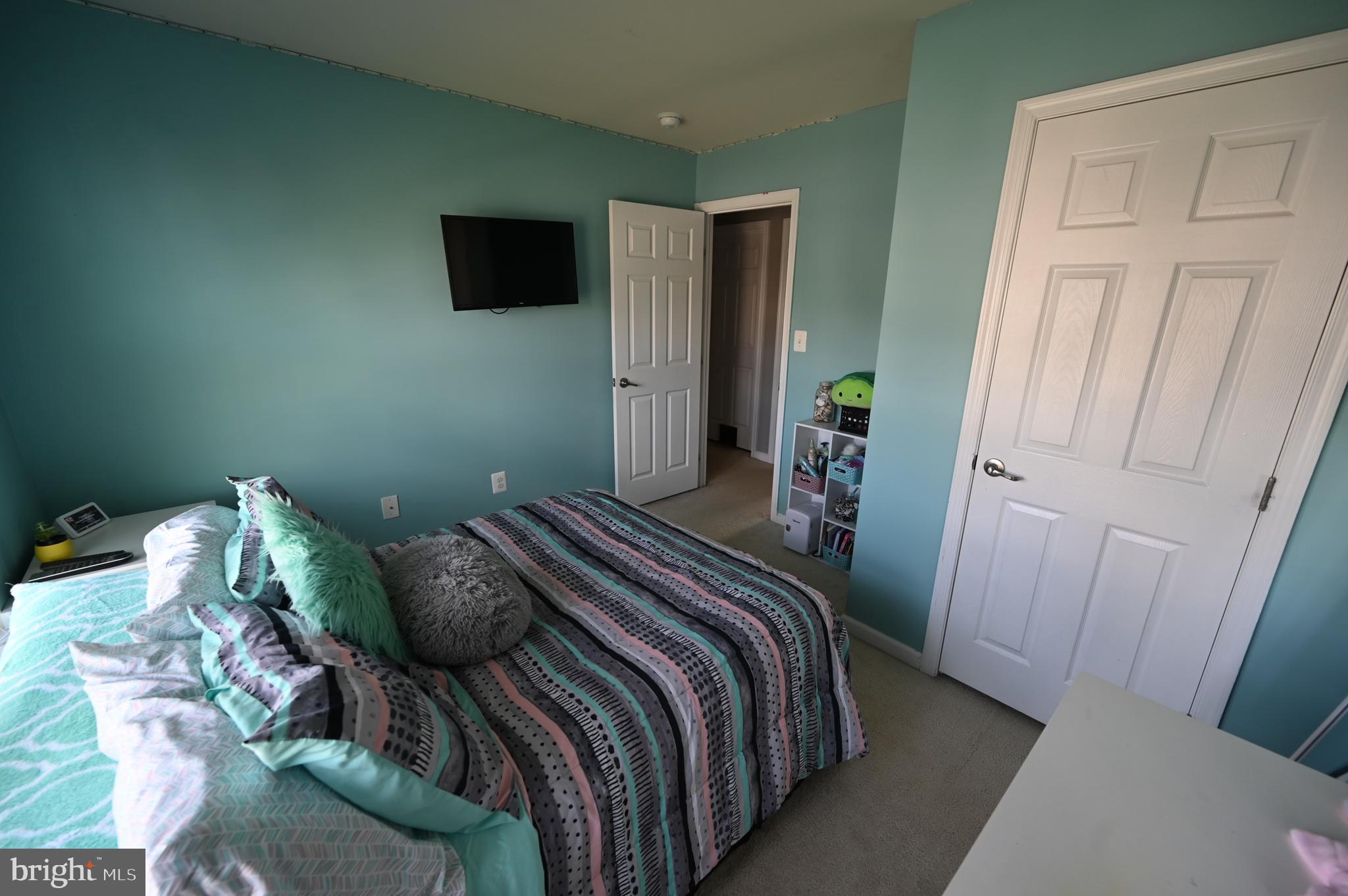 2528 Codorus Lane Spring Grove, PA 17362 - Photo 54 of 77 a bedroom with a bed and a flat tv screen