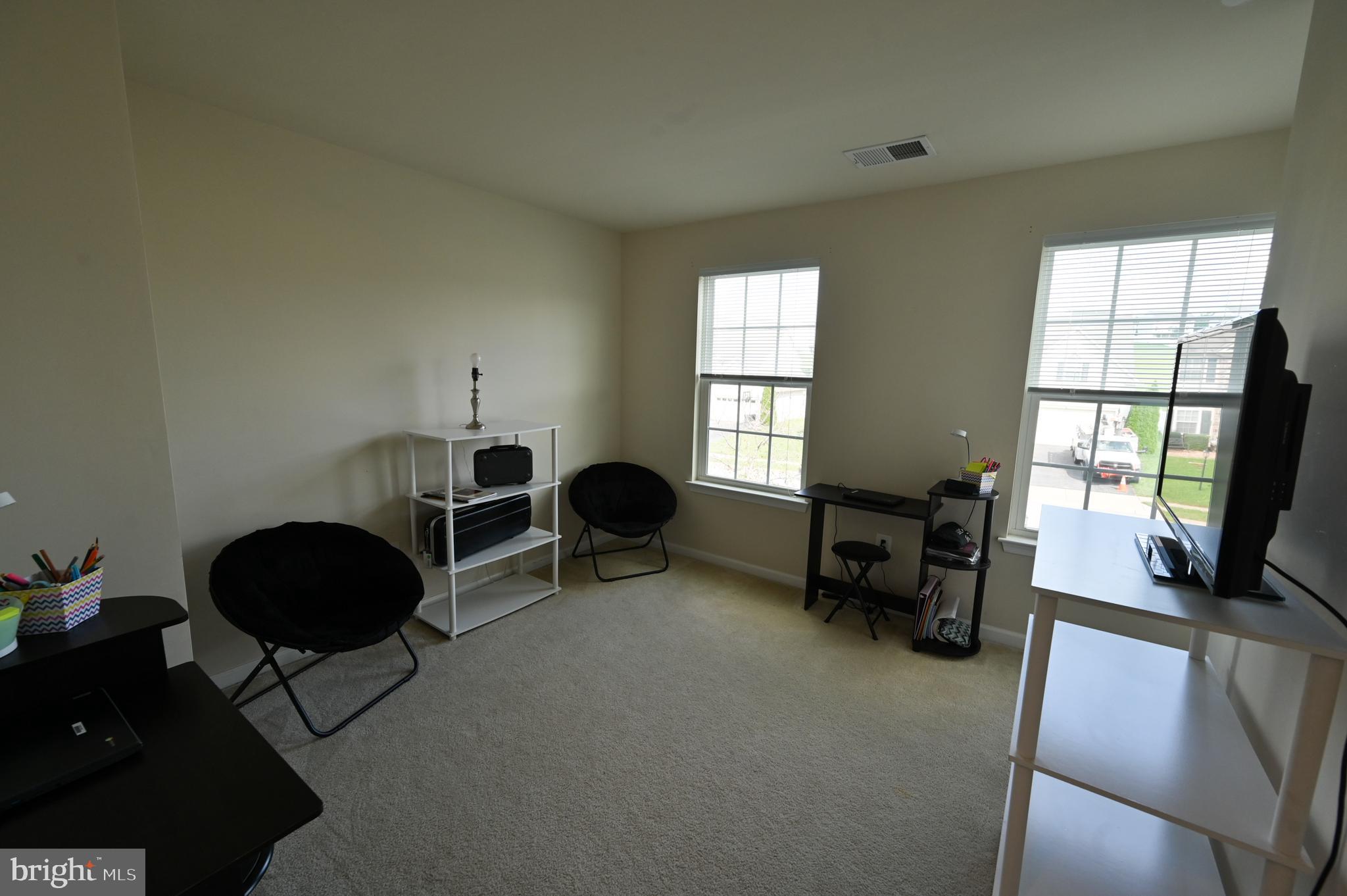 2528 Codorus Lane Spring Grove, PA 17362 - Photo 62 of 77 a living room with furniture and a flat screen tv