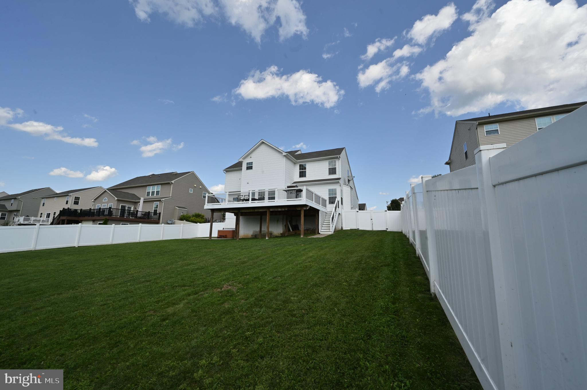2528 Codorus Lane Spring Grove, PA 17362 - Photo 70 of 77 a view of a big house with a big yard potted plants and large tree