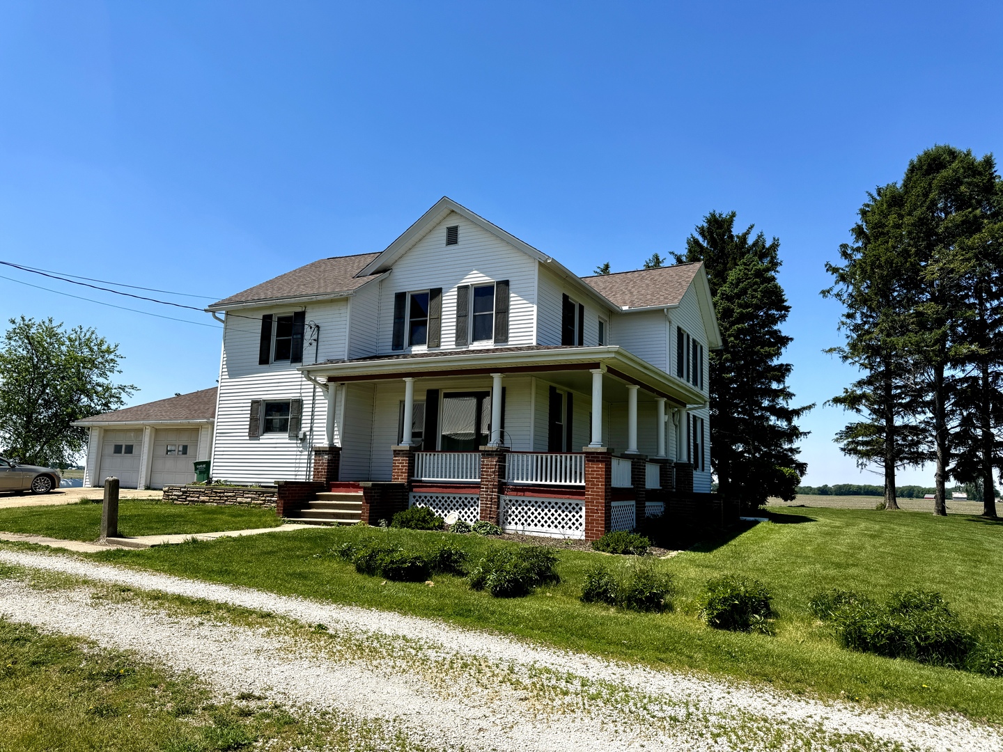 16606 West Backbone Road Princeton, IL 61356 - Photo 1 of 40 a front view of a house with a yard