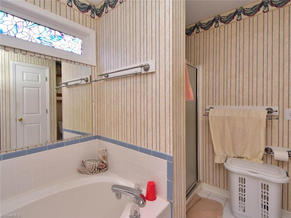 3936 Johnson Street High Point, NC 27265 - Photo 15 of 21 Master bathroom with tub