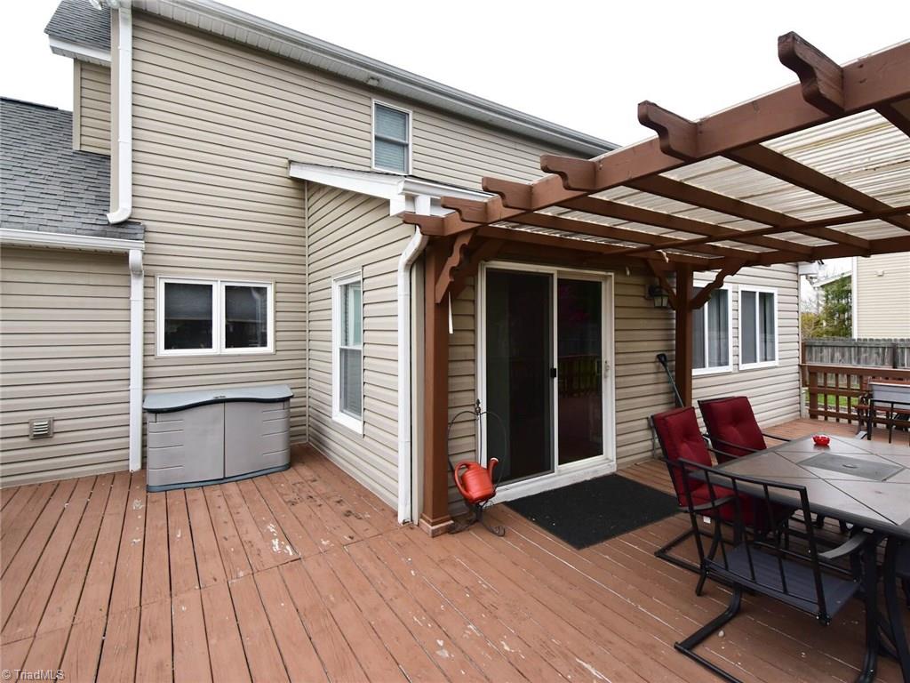 3936 Johnson Street High Point, NC 27265 - Photo 20 of 21 Back deck off sunroom