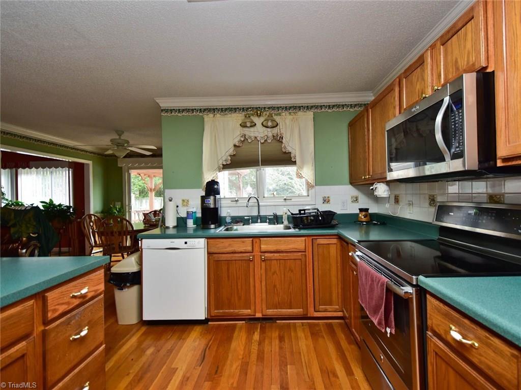 3936 Johnson Street High Point, NC 27265 - Photo 9 of 21 Lots of natural light into the kitchen
