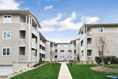 a view of building with yard