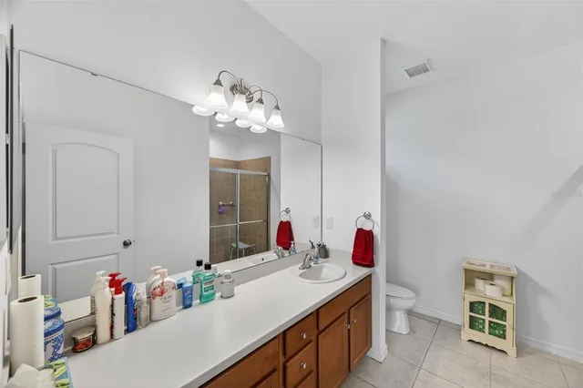 a bedroom with a workspace