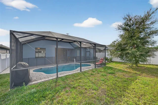 $425,000 | 13737 Garden Hills Drive, Spring Hill, FL 34609