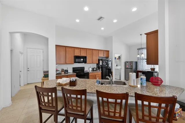 a view of a dining room with furniture