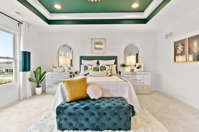 a spacious bathroom with a sink and a mirror