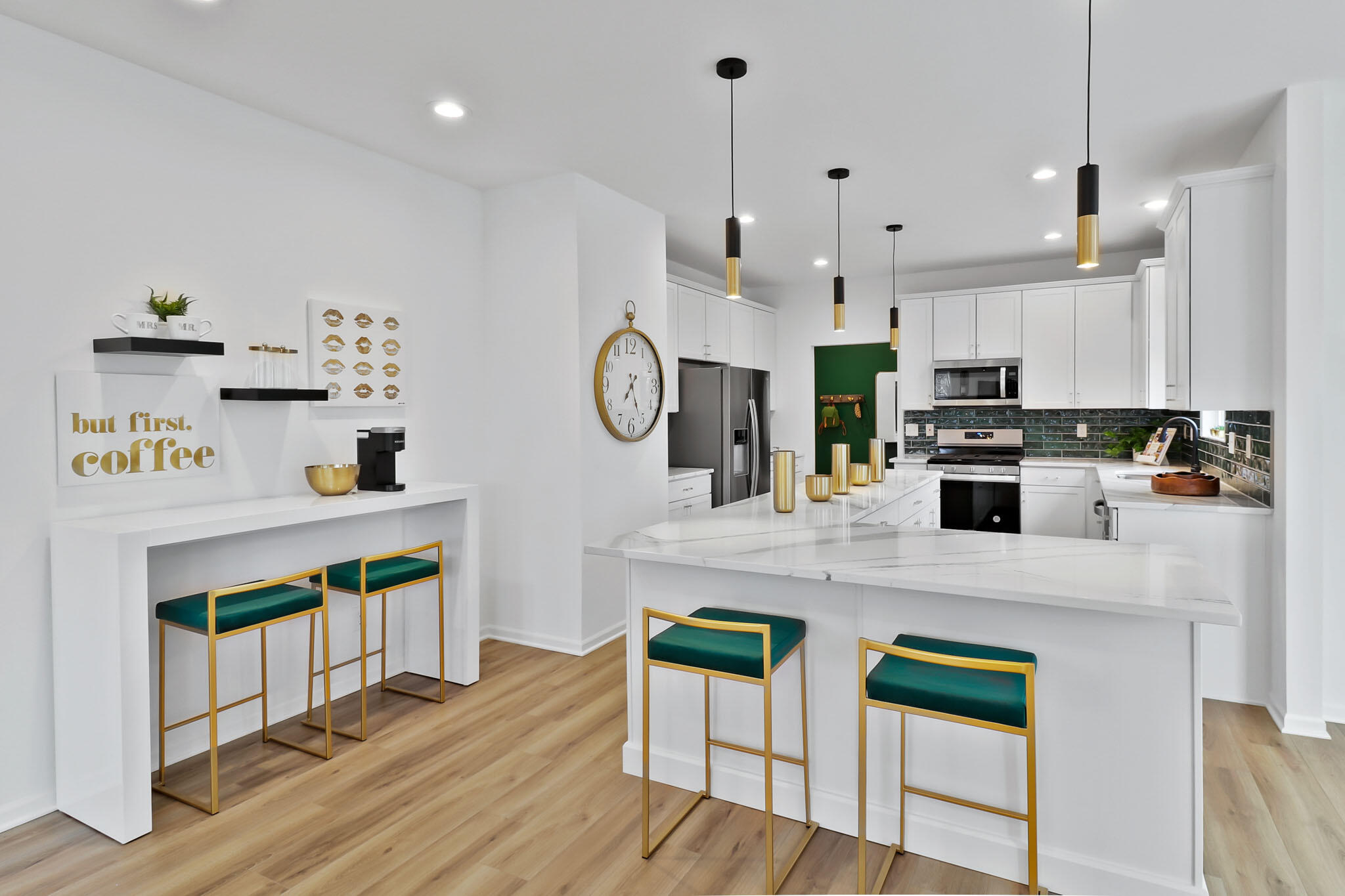 6786 East 104th Avenue Crown Point, IN 46307 - Photo 8 of 21 a kitchen with stainless steel appliances granite countertop a stove a refrigerator a oven a sink a stove and white cabinets with wooden floor