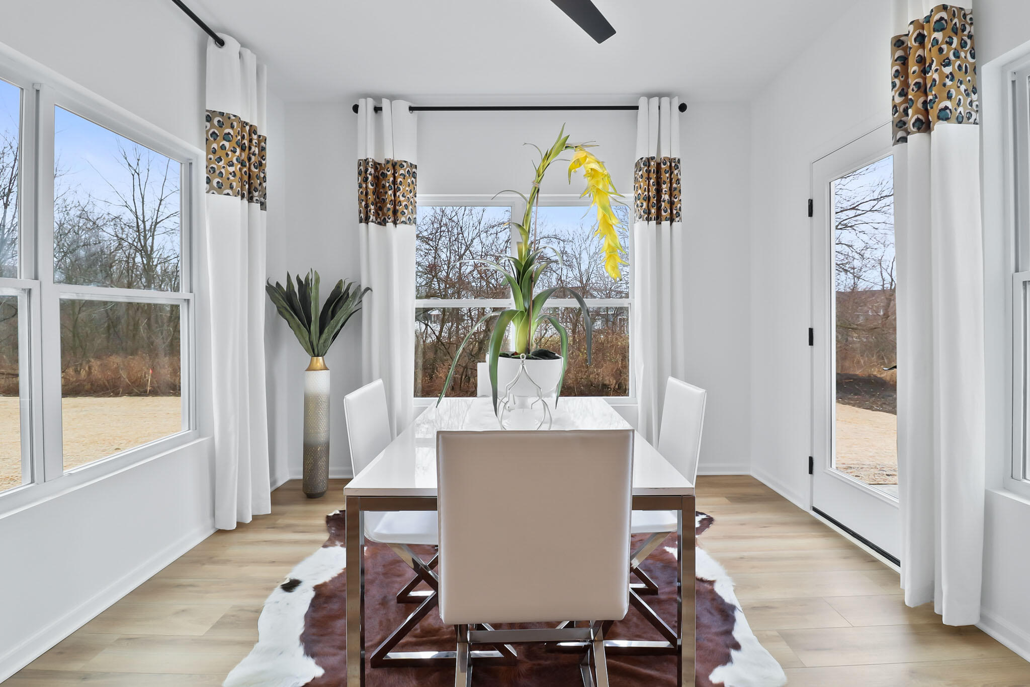 6786 East 104th Avenue Crown Point, IN 46307 - Photo 10 of 21 a dining room with furniture and window